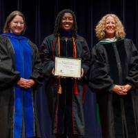 Faculty holding second award